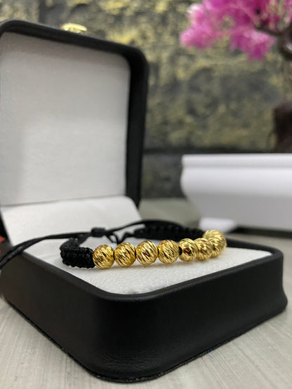 Pulsera 11 balines #6 tipo oro